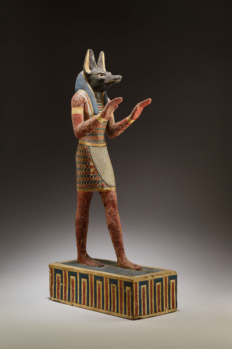 אנוביס, אל מצרי בעל ראש של  "תן", אל הקשור למוות, שוקל את לב המתים במאזני הצדק, 332-30 לפני הספירה